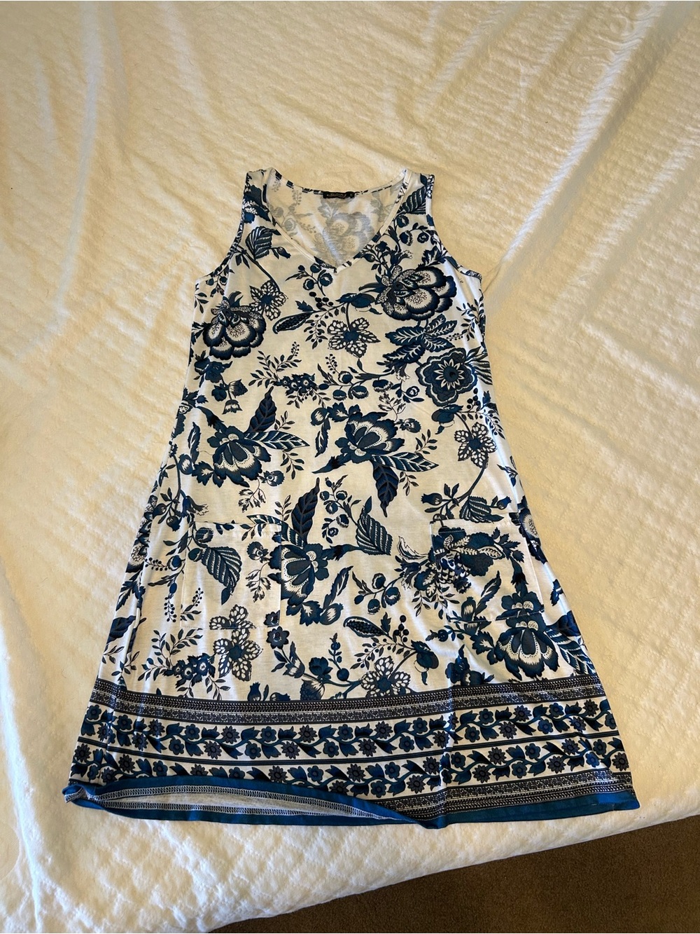 Sleeveless White Dress with Blue Floral Print